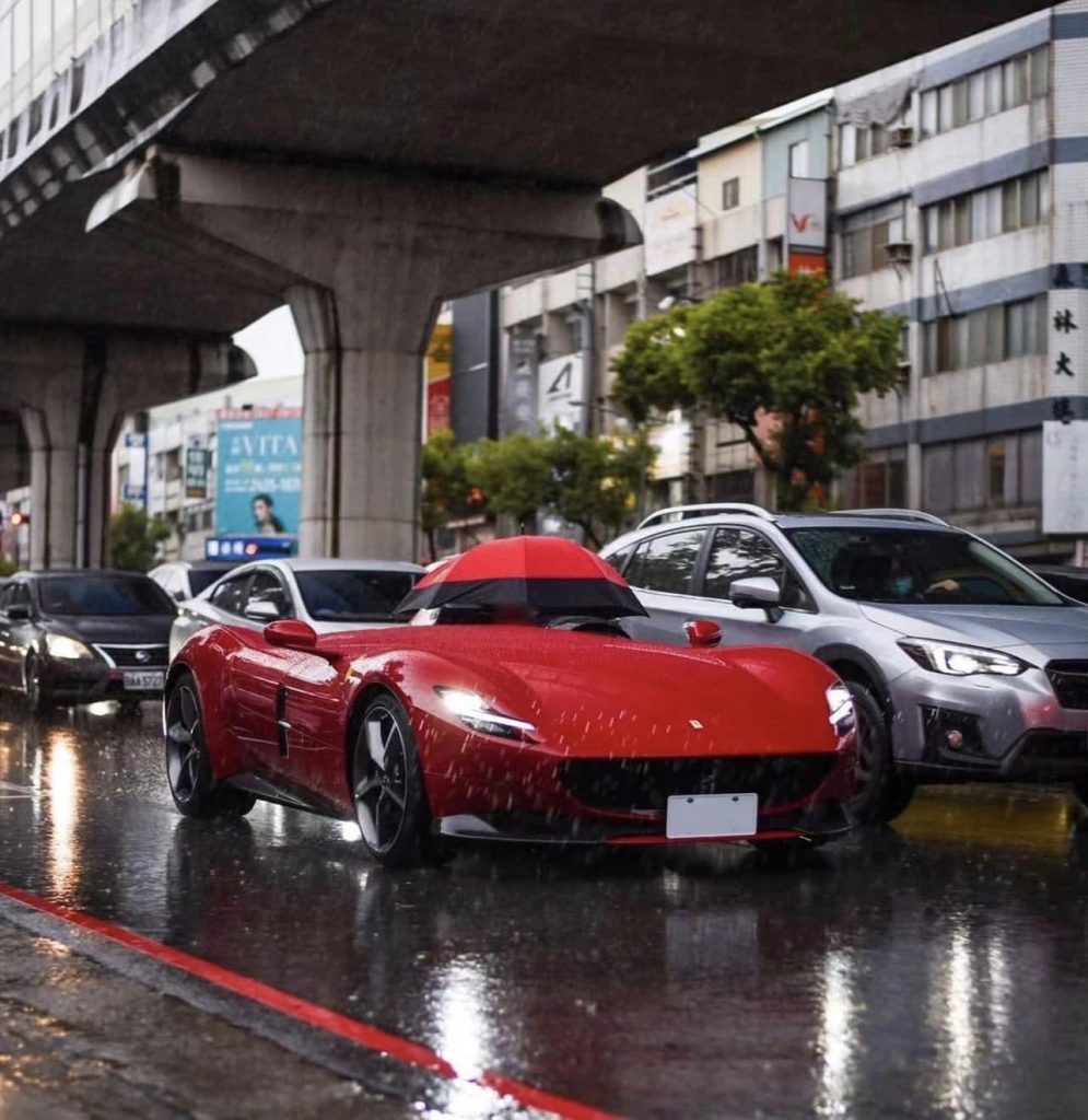 Đại gia lái Ferrari Monza hơn 65 tỷ trên phố nhưng phải dùng ô che mưa, tương lai không xa của đại gia Minh Nhựa